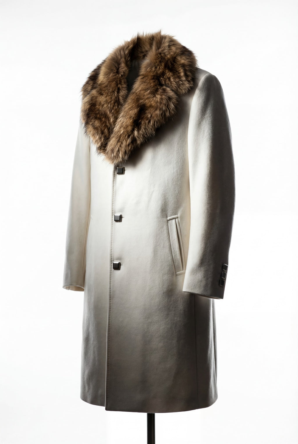Ivory wool coat with a plush brown fur collar. Elegant winter outerwear.